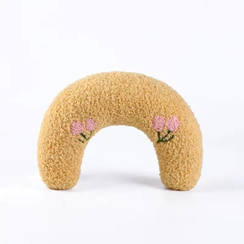 U-shaped pet pillow for cats and small dogs—ideal for neck support, deep sleep, and cozy headrest.