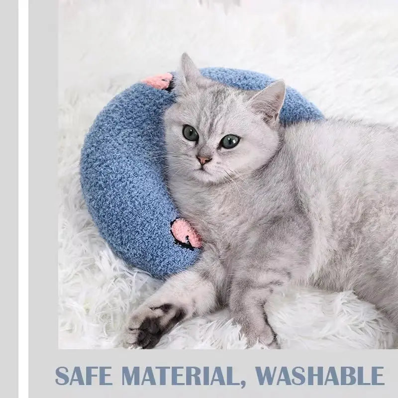U-shaped pet pillow for cats and small dogs—ideal for neck support, deep sleep, and cozy headrest.