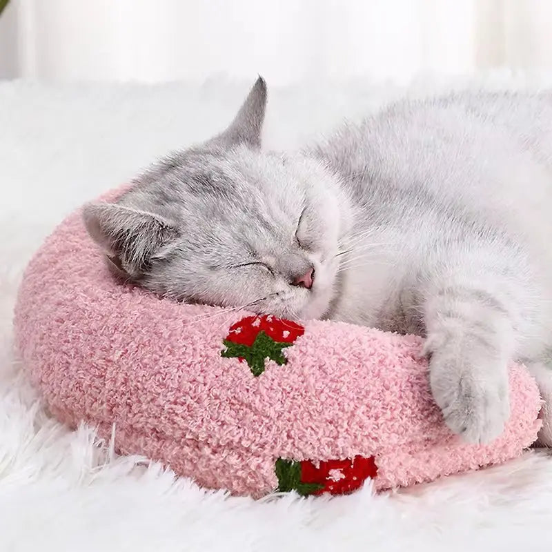 U-shaped pet pillow for cats and small dogs—ideal for neck support, deep sleep, and cozy headrest.